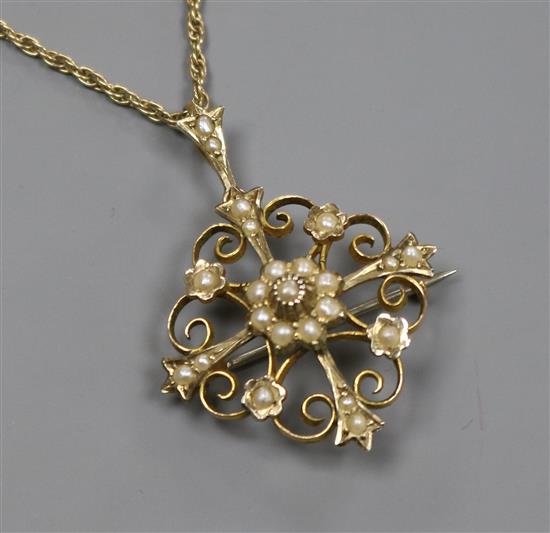 An Edwardian 9ct gold and seed pearl set pendant brooch, on a later 9ct gold ropetwist chain, pendant 26mm.